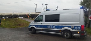 policjanci zabezpieczający miejsce zdarzenia.